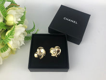 Load image into Gallery viewer, Chanel 22b large heart turnlock earrings, gold tone
