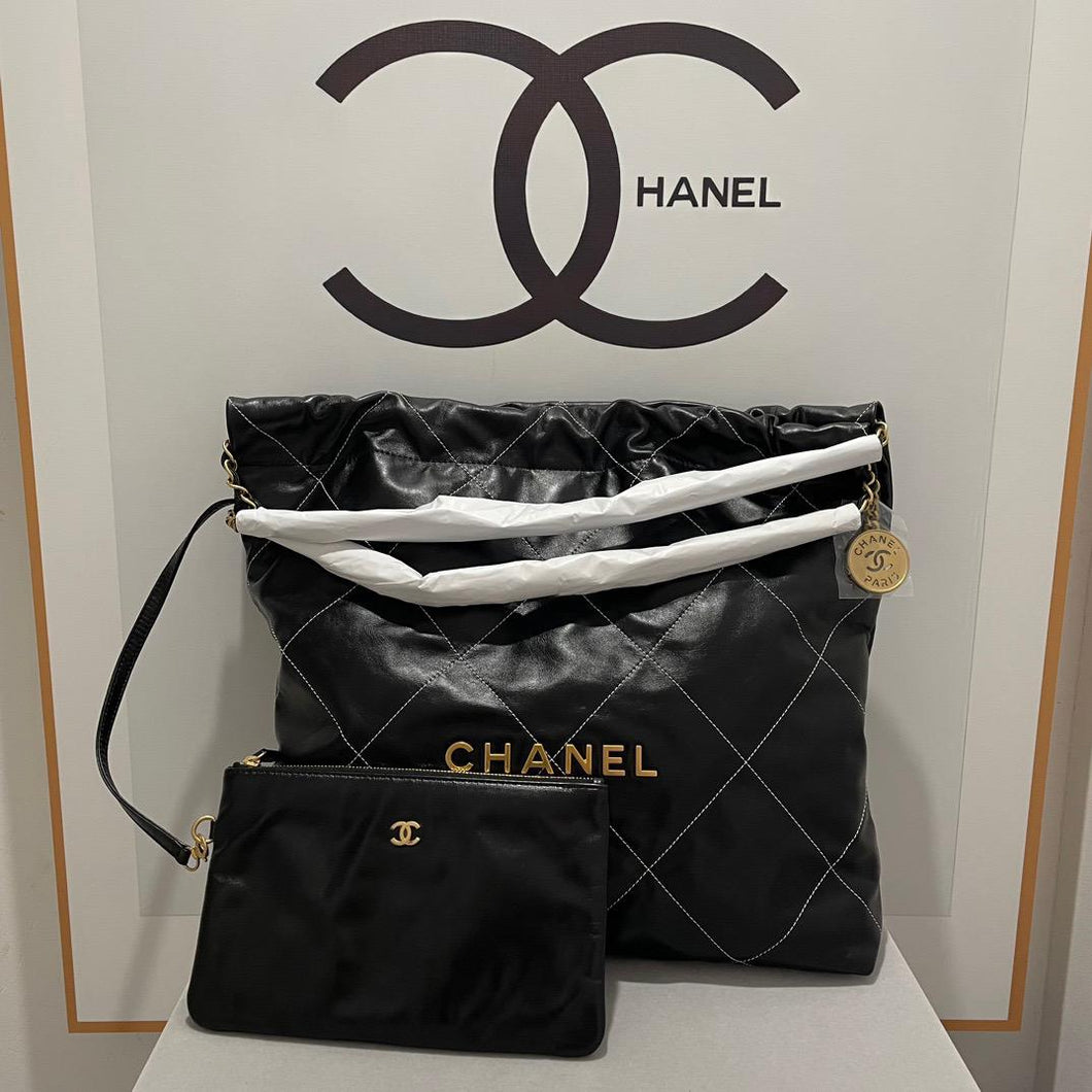 Chanel 22 black medium calfskin in contract stitching, with pouch