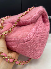 Load image into Gallery viewer, Chanel bag medium pink fur with gold hardware.
