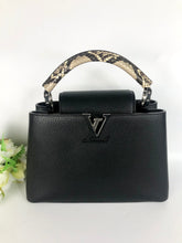 Load image into Gallery viewer, Louis Vuitton 2023 black capucines BB in taurillon leather with gold hardware and snakeskin handle
