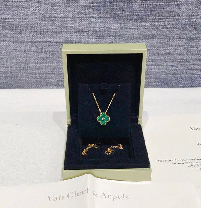 Very rare Van Cleef & Arpels (VCA) 2013 rare green malachite diamond holiday pendant, 18k gold