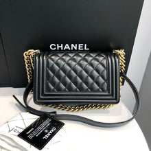 Load image into Gallery viewer, Chanel small black caviar boy bag, with gold hdw
