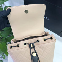 Load image into Gallery viewer, Chanel beige black filigree backpack
