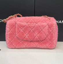 Load image into Gallery viewer, Chanel bag medium pink fur with gold hardware.
