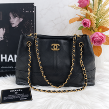 Load image into Gallery viewer, Chanel 25A hobo small black calfskin, coco base shopping bag with light gold hardware
