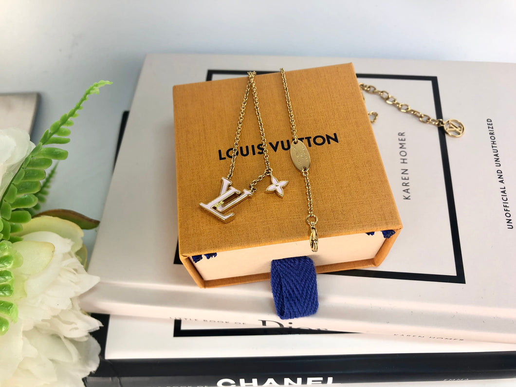 Louis Vuitton iconic pink enamel and brass necklace