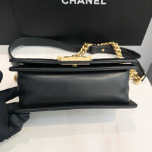 Load image into Gallery viewer, Chanel small black caviar boy bag, with gold hdw
