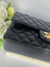 Load image into Gallery viewer, Chanel black medium lambskin classic, with gold hdw
