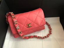 Load image into Gallery viewer, Chanel lambskin woven logo flap from 2021 cruise collection.
