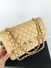 Load image into Gallery viewer, Chanel beige caviar medium classic flap, gold hdw
