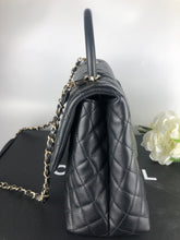 Load image into Gallery viewer, Chanel large black caviar coco handle, light gold hardware
