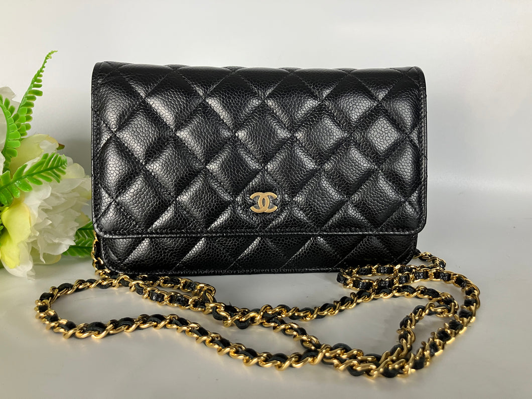 Chanel microchip black caviar (WOC) wallet on chain, with gold hardware