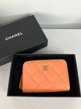 Load image into Gallery viewer, Chanel 2023 peach lambskin coin purse, card holder. Light gold hdw
