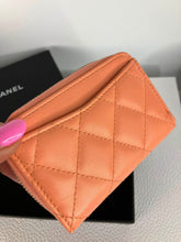 Load image into Gallery viewer, Chanel 2023 peach lambskin coin purse, card holder. Light gold hdw
