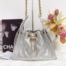 Load image into Gallery viewer, Chanel 25 small in silver caviar, aged gold hdw
