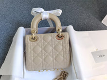Load image into Gallery viewer, Lady Dior mini beige with gold hardware.
