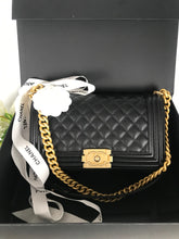 Load image into Gallery viewer, Chanel 25 series black caviar old medium with aged gold hdw
