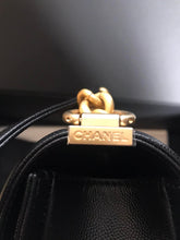 Load image into Gallery viewer, Chanel 25 series black caviar old medium with aged gold hdw
