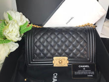 Load image into Gallery viewer, Chanel 25 series black caviar old medium with aged gold hdw
