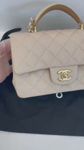 Load and play video in Gallery viewer, Chanel 23p beige / caramel two tone mini lambskin with gold hardware
