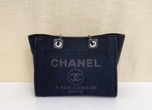 Load image into Gallery viewer, Chanel black deauville with pouch
