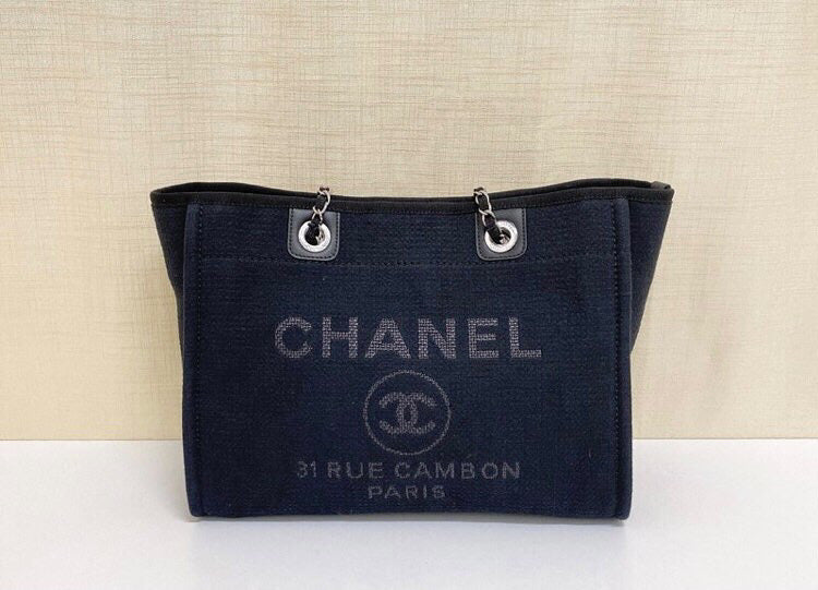 Chanel black deauville with pouch